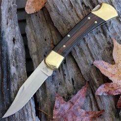 Buck Knives Buck 110BRS Folding Hunter, 3.75" 420HC Plain Blade, Woodgrain Handle, Leather Sheath